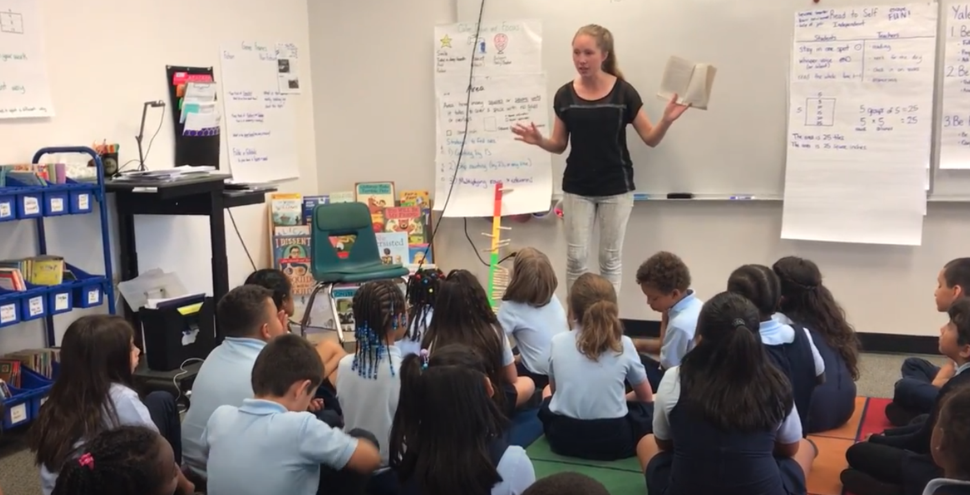 Katherine teaching a group of students. 